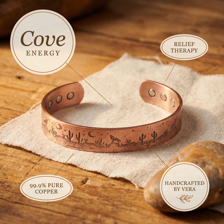 Desert scene copper cuff bracelet on wooden surface showing warm copper tone finish