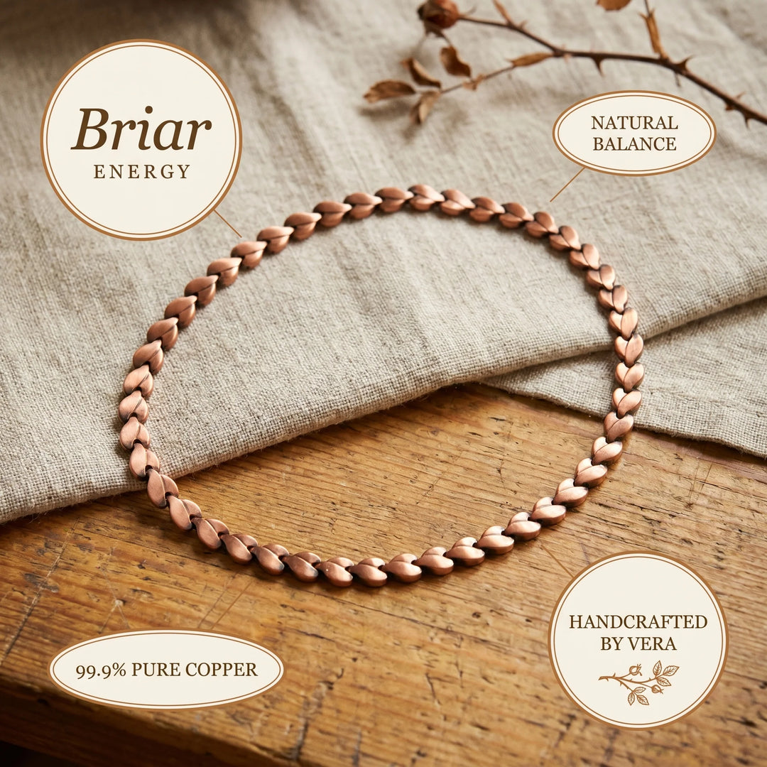 Handcrafted copper chain necklace showing individual heart-shaped links forming cohesive braided pattern texture