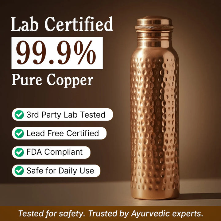 Close-up view of hammered copper water bottle showing hand-finished dimpled surface pattern and warm metallic tone