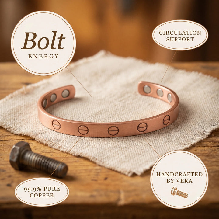 Adjustable women's copper bangle resting on natural linen with woodworking tools in background