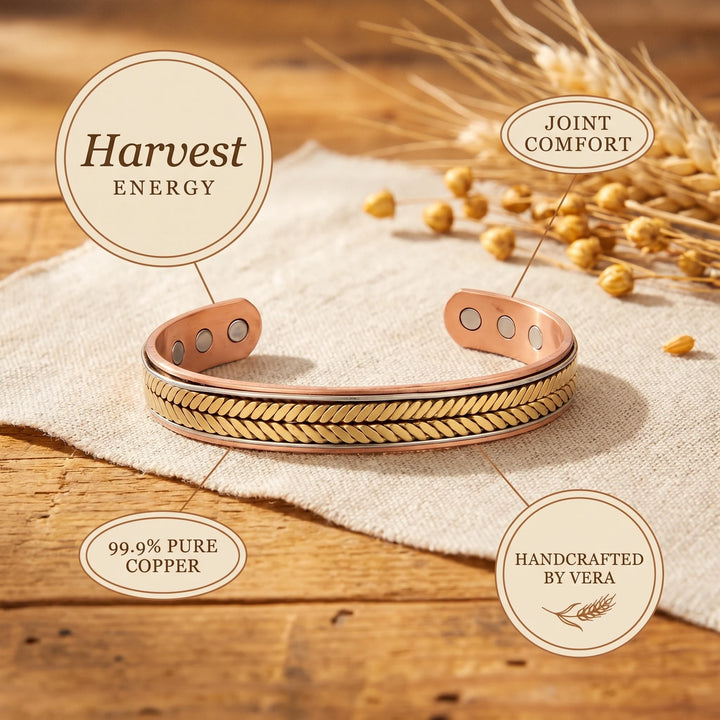 Detail of hand-pressed chevron pattern on copper cuff bracelet with warm metallic tone