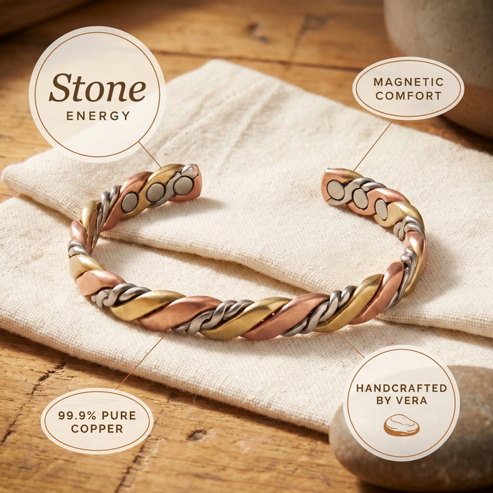 Tri-tone copper bangle with adjustable fit displayed on wooden surface with crafting tools