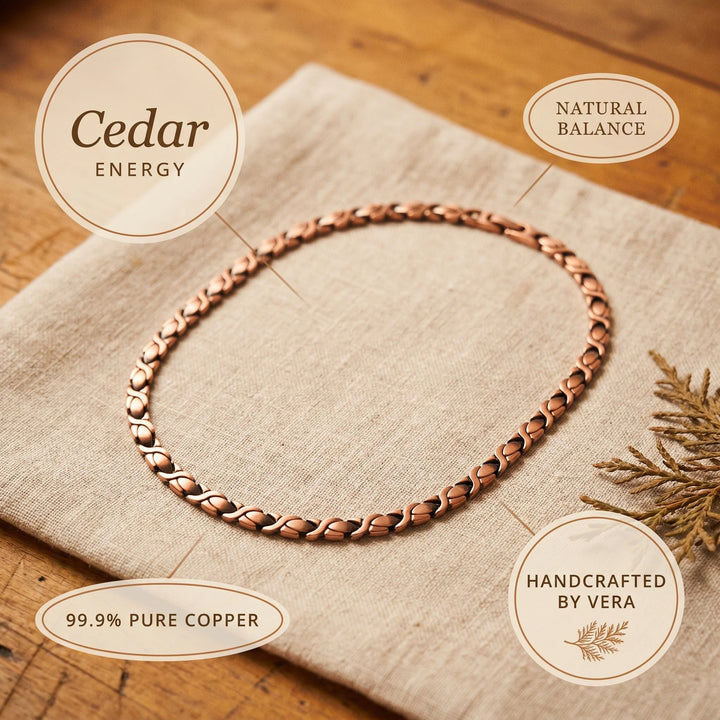 Full view of copper chain necklace with X-link pattern and warm copper tones on neutral background