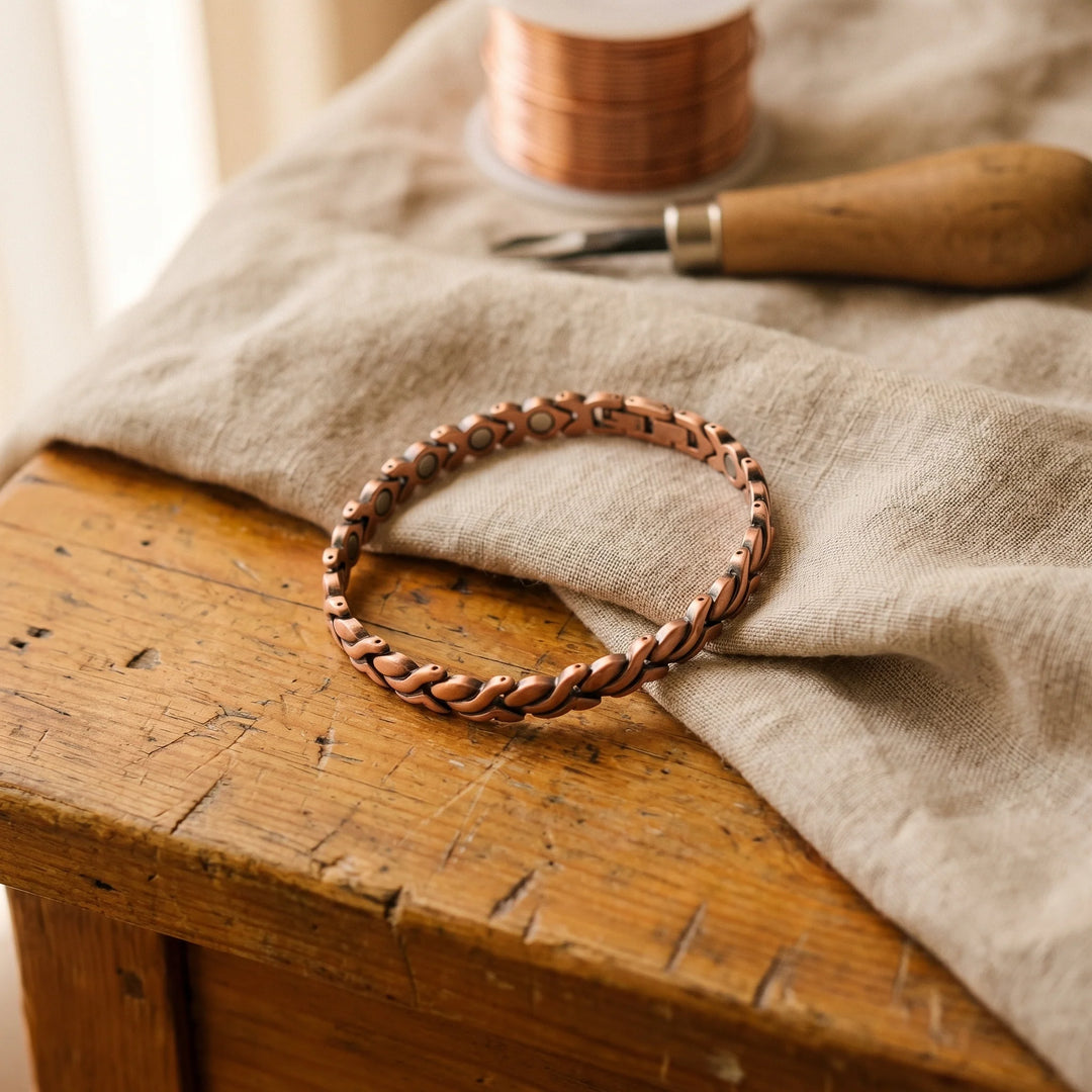 Close-up view of copper chain anklet showing interlocking link design and adjustable fit