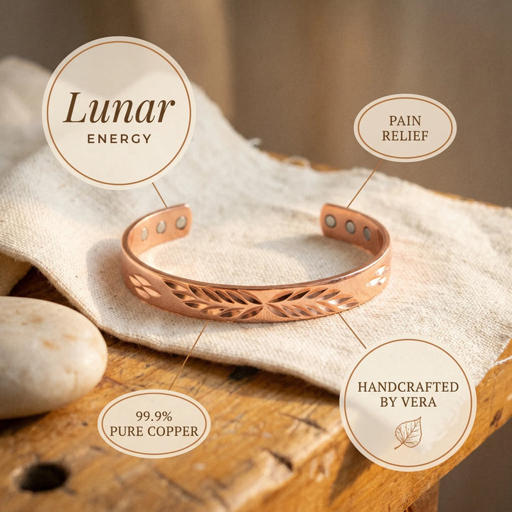 Detail shot of polished copper bracelet showing intricate cut-out leaf motif