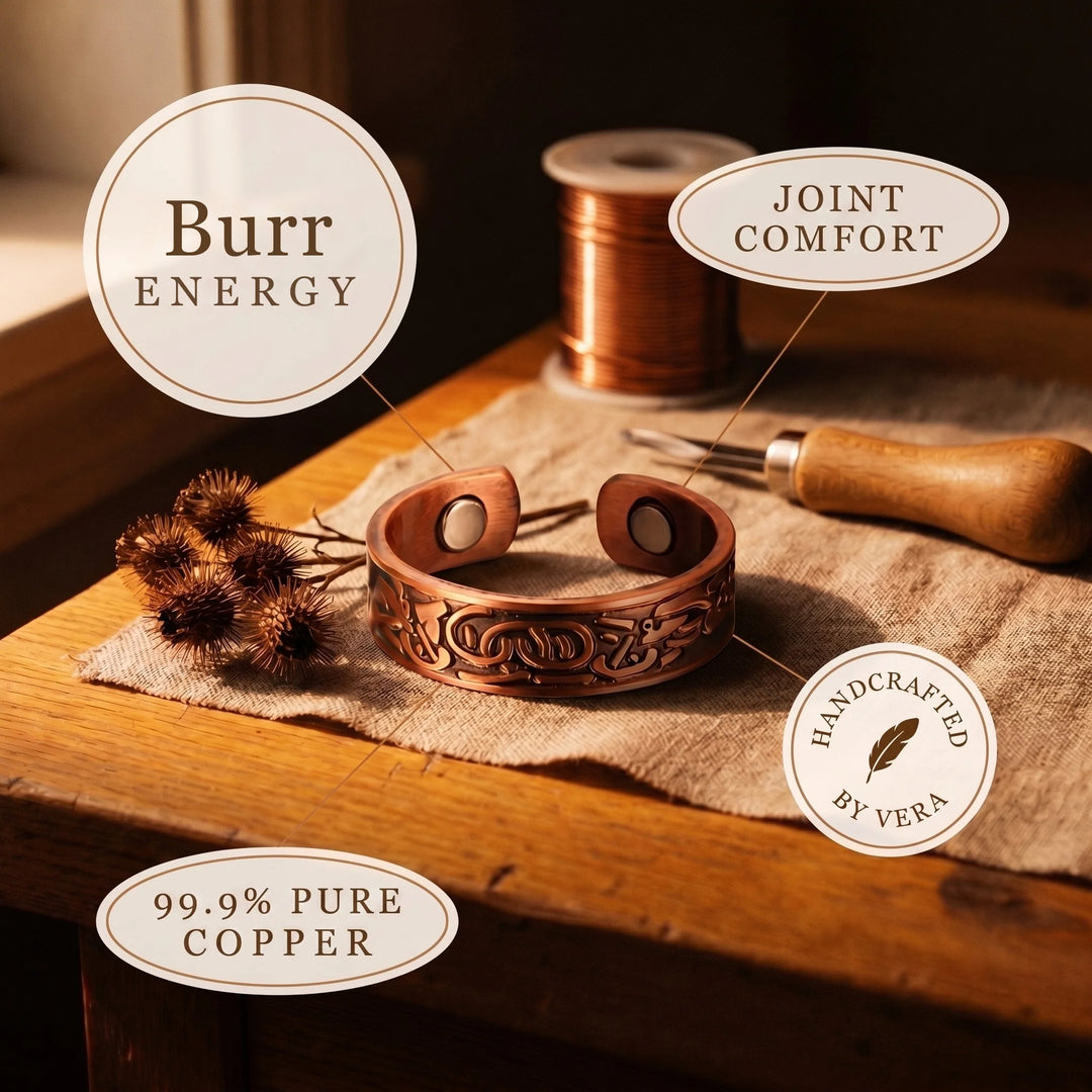 Copper adjustable ring showing intricate scrollwork engraving and open band construction for everyday wear