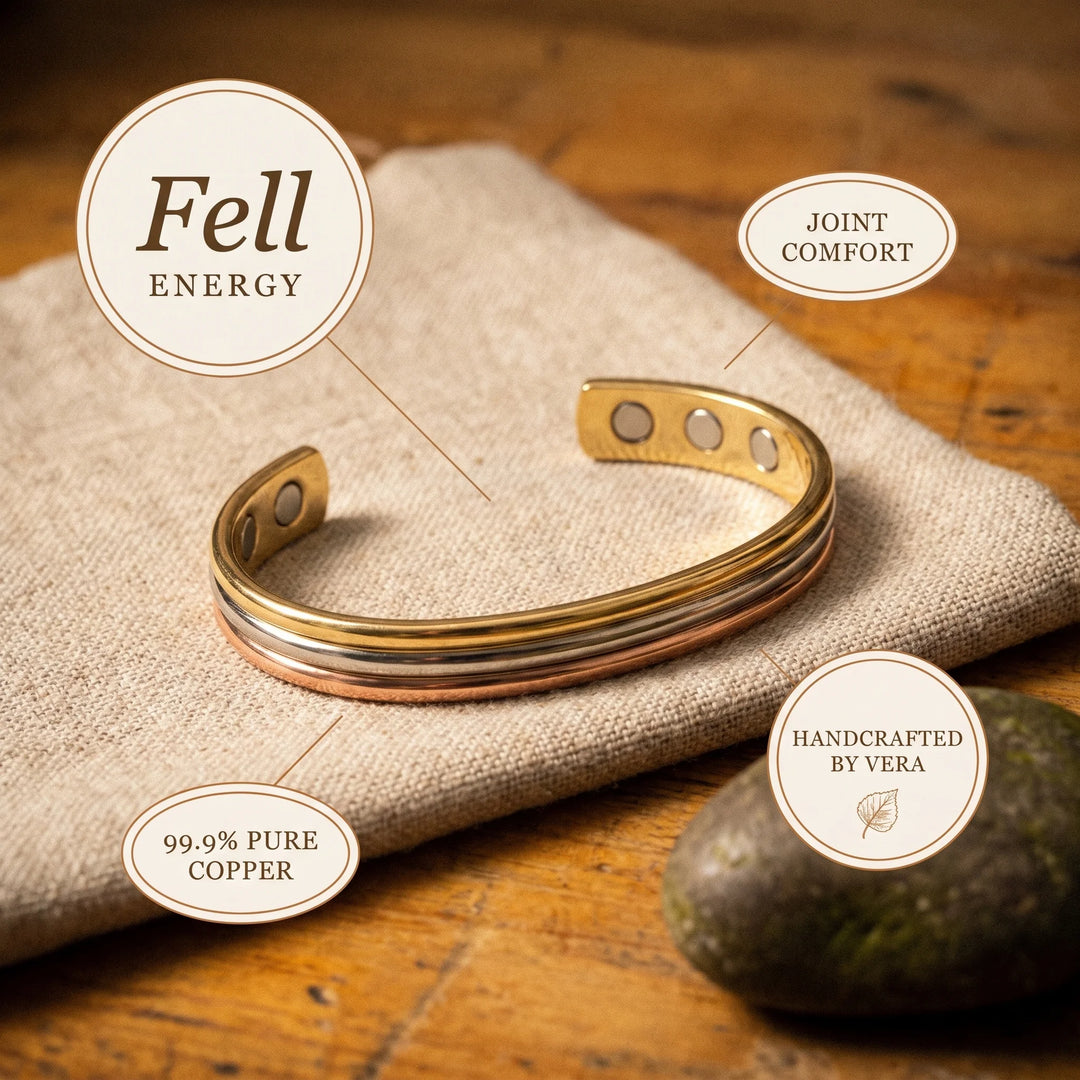 Detail of tri-tone copper bracelet with embedded magnets visible through circular openings