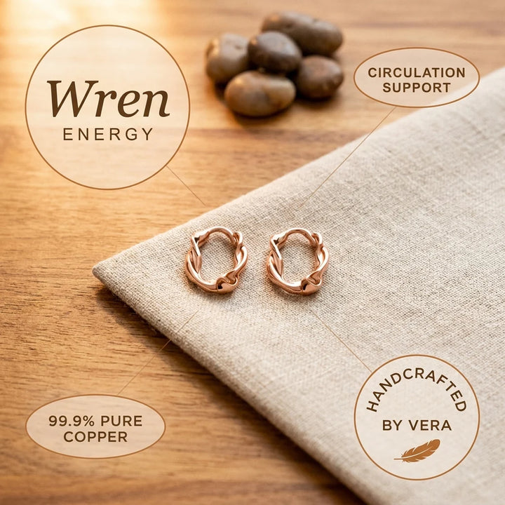 Rose gold tone twisted hoop earrings with secure clasp closure mechanism