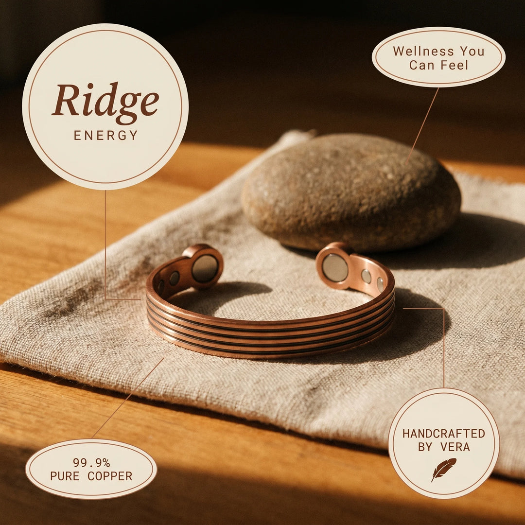 Adjustable copper cuff bracelet showing open-ended design and parallel groove detailing across band